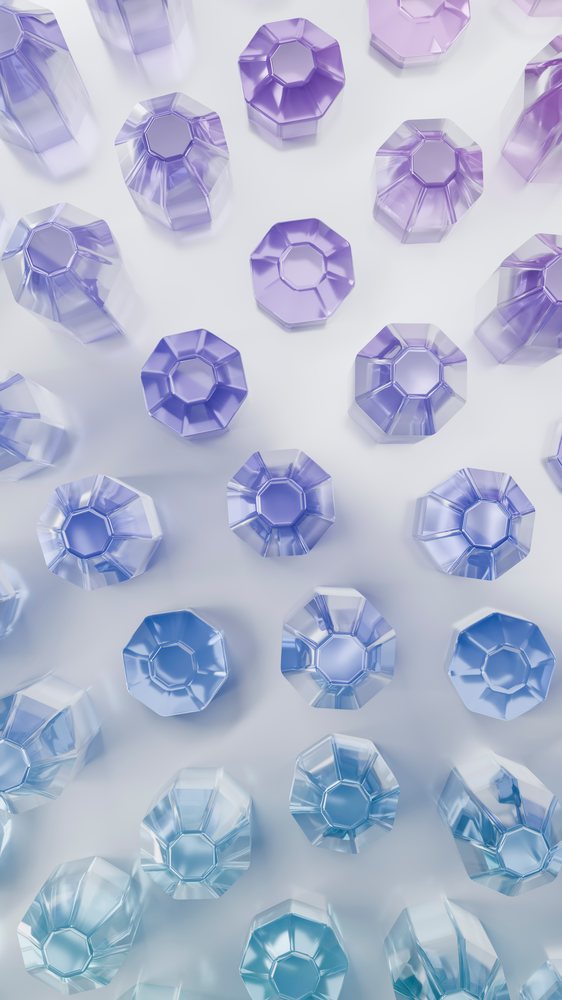 Patterned arrangement of faceted purple and blue transparent octagonal