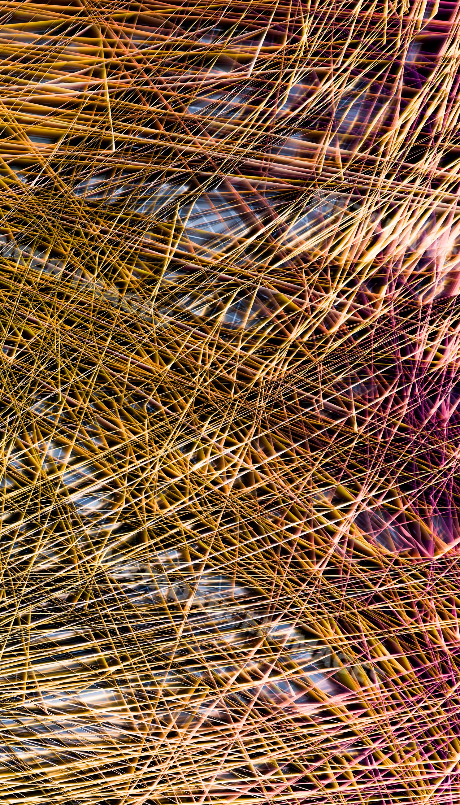 An abstract close-up image of colorful overlapping thin lines creating