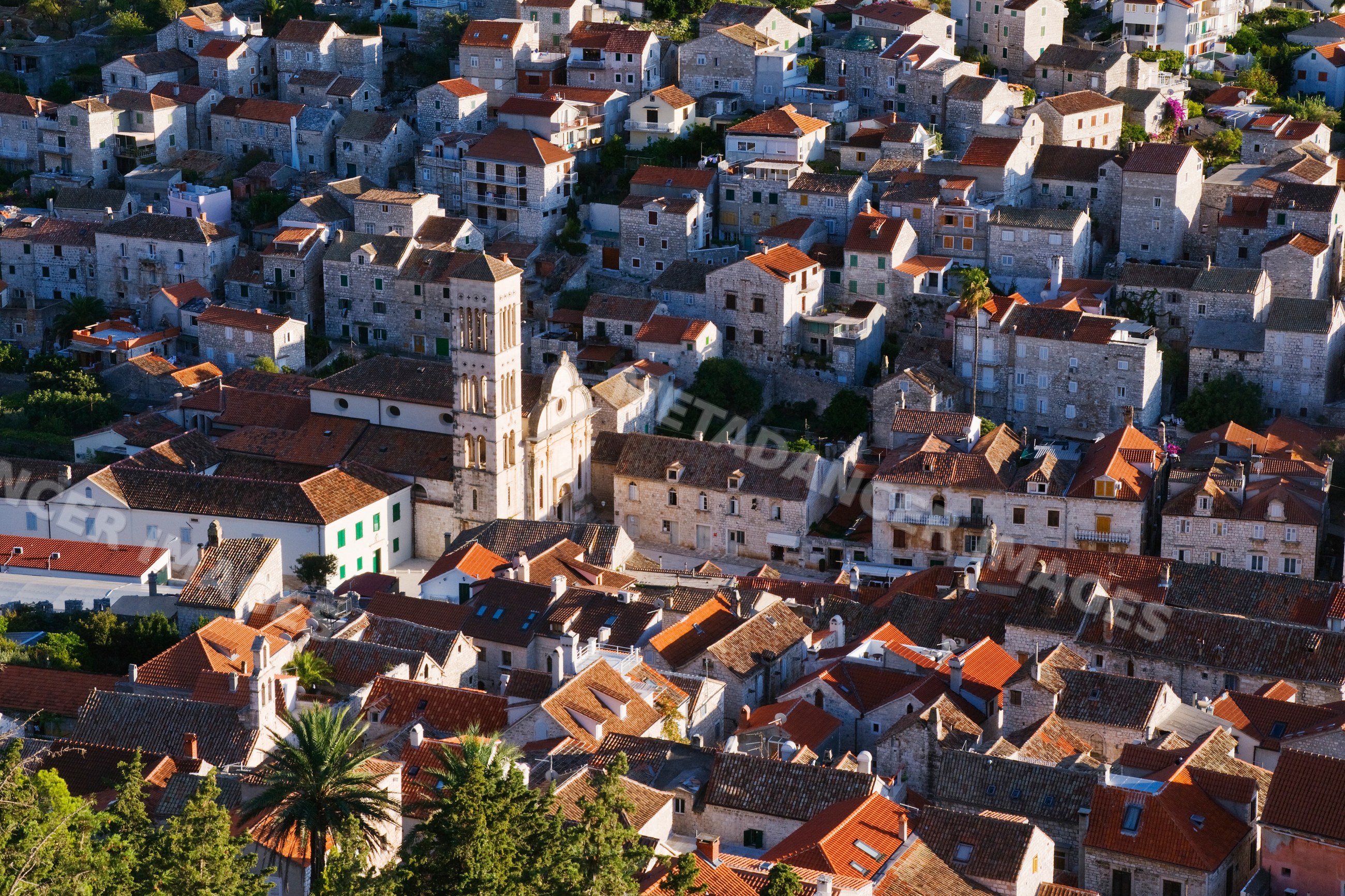 Town of hvar with red tile roofs and stone buildings