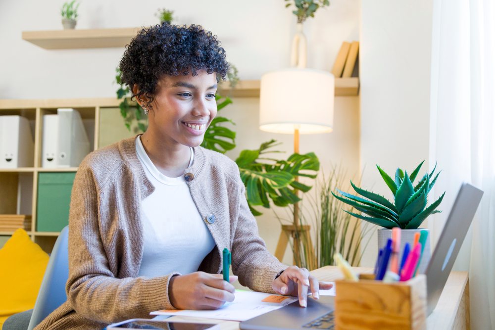 African American woman working on laptop