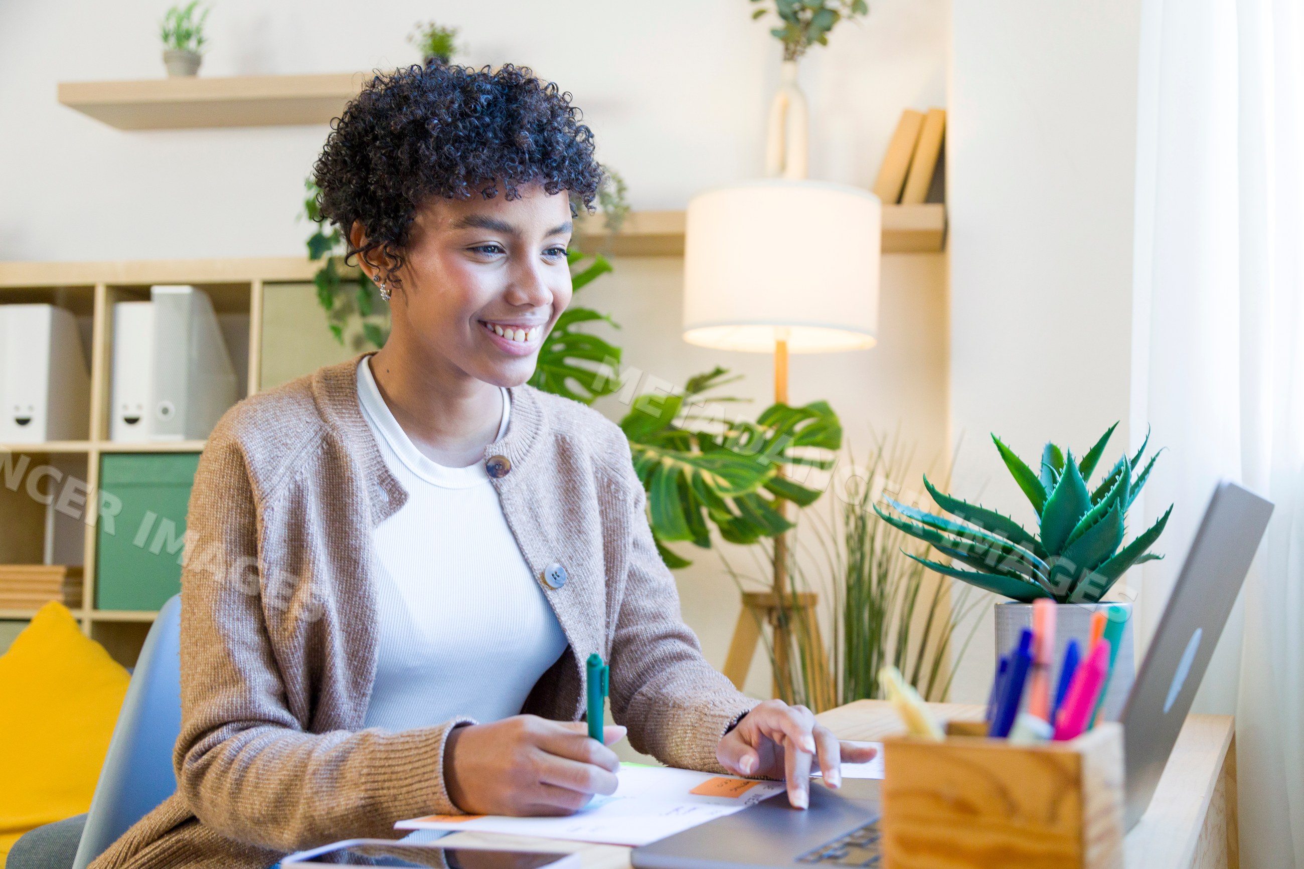 African American woman working on laptop