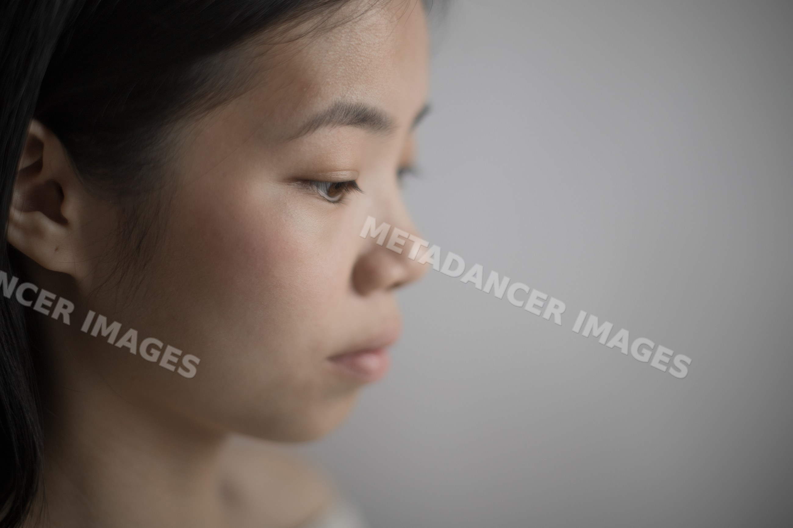 Emotional Southeast Asian woman portrait