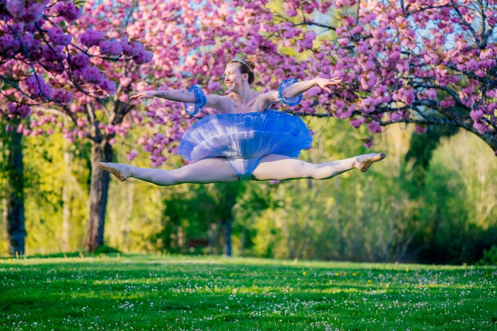 Ballerina performing a split jump