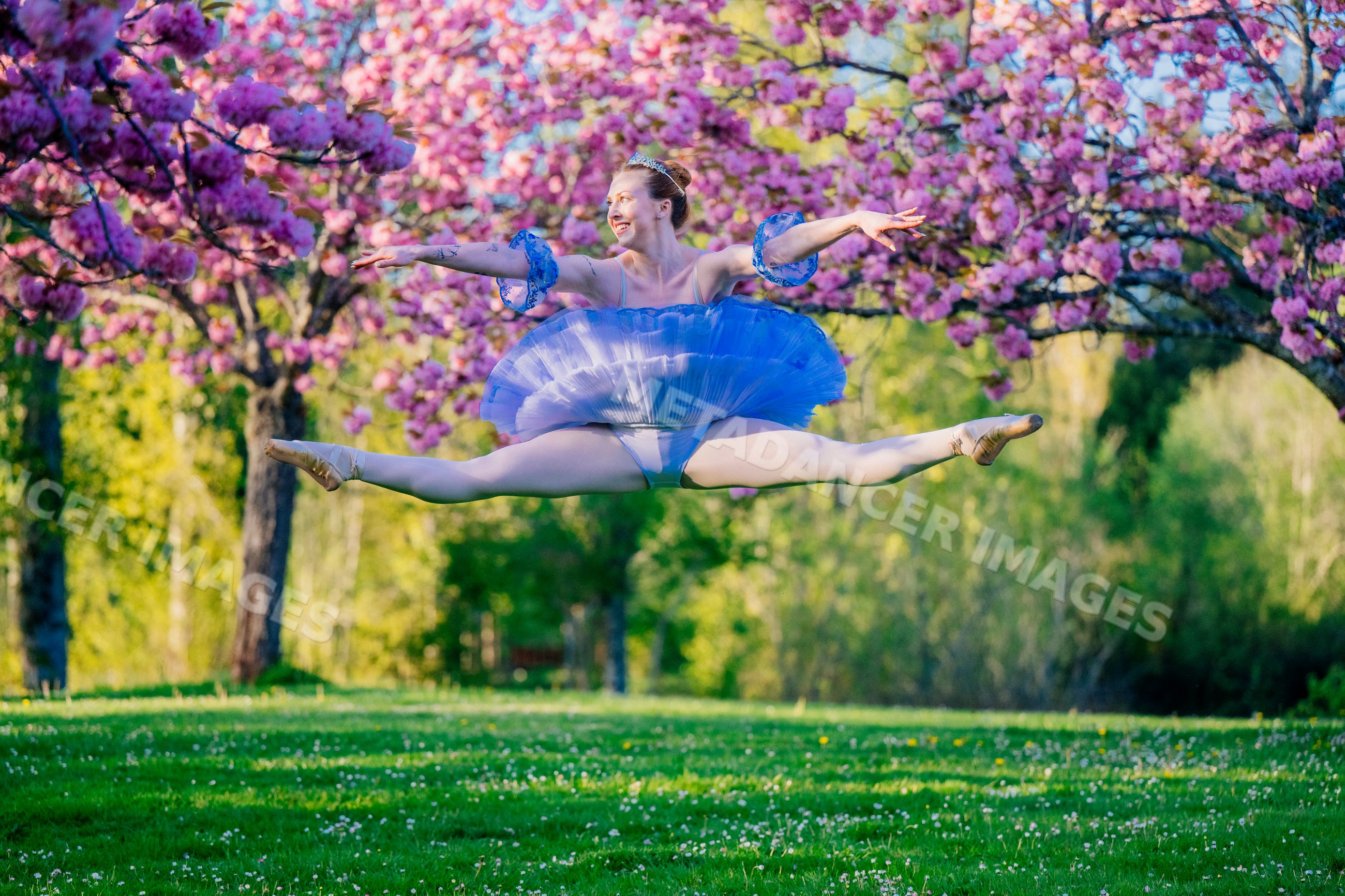 Ballerina performing a split jump
