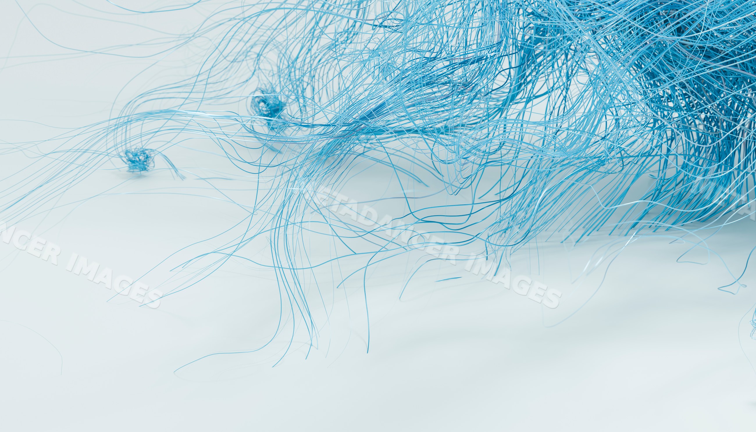 Blue fine threads tangled on a soft light background