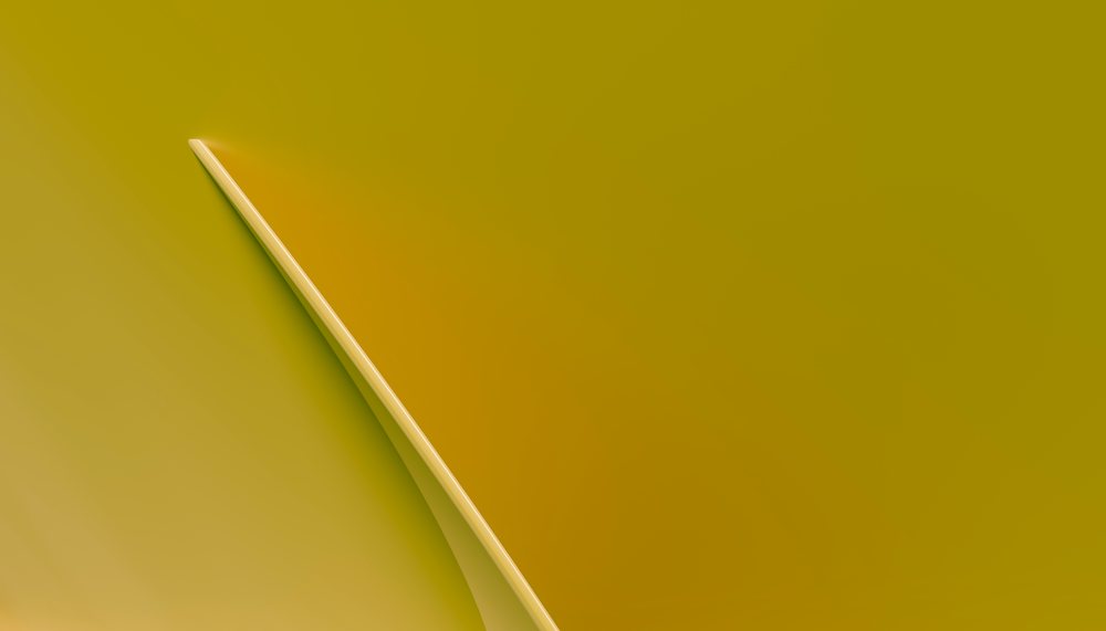 Curved yellow architectural structure with smooth modern design