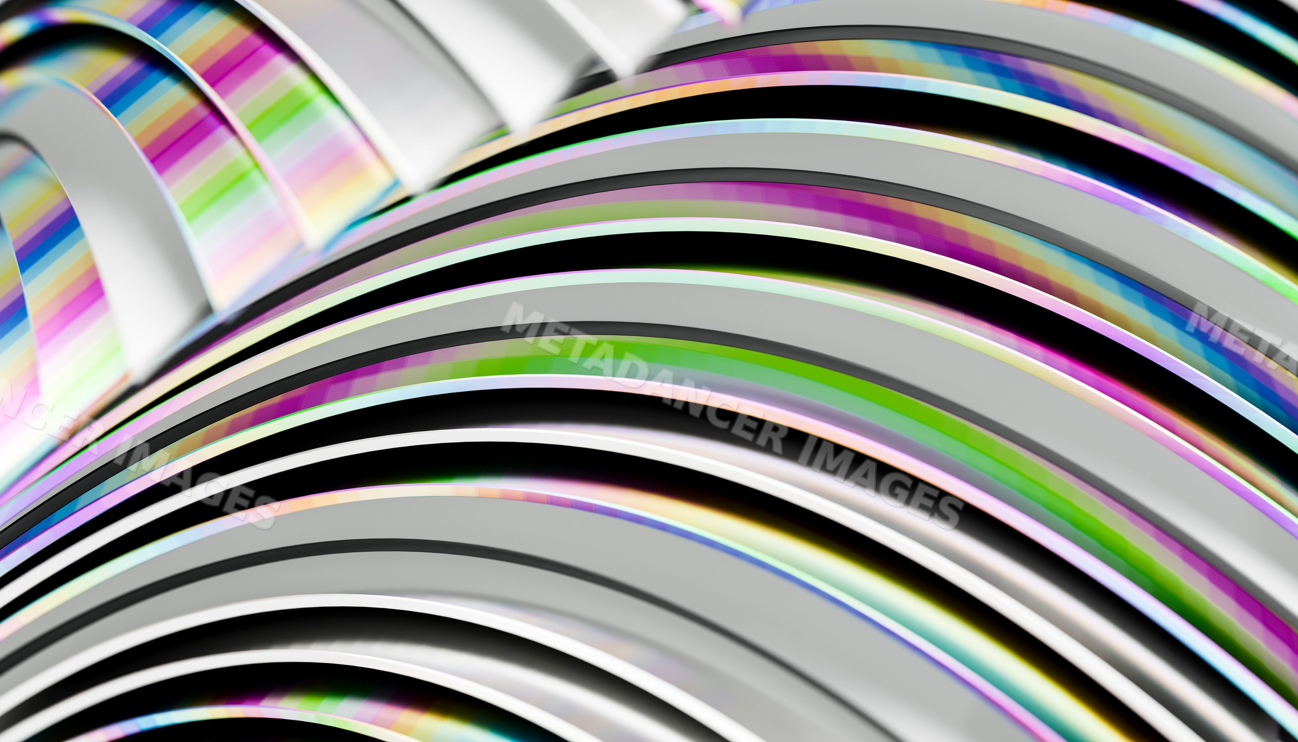 Stack of compact discs with colorful reflective surfaces