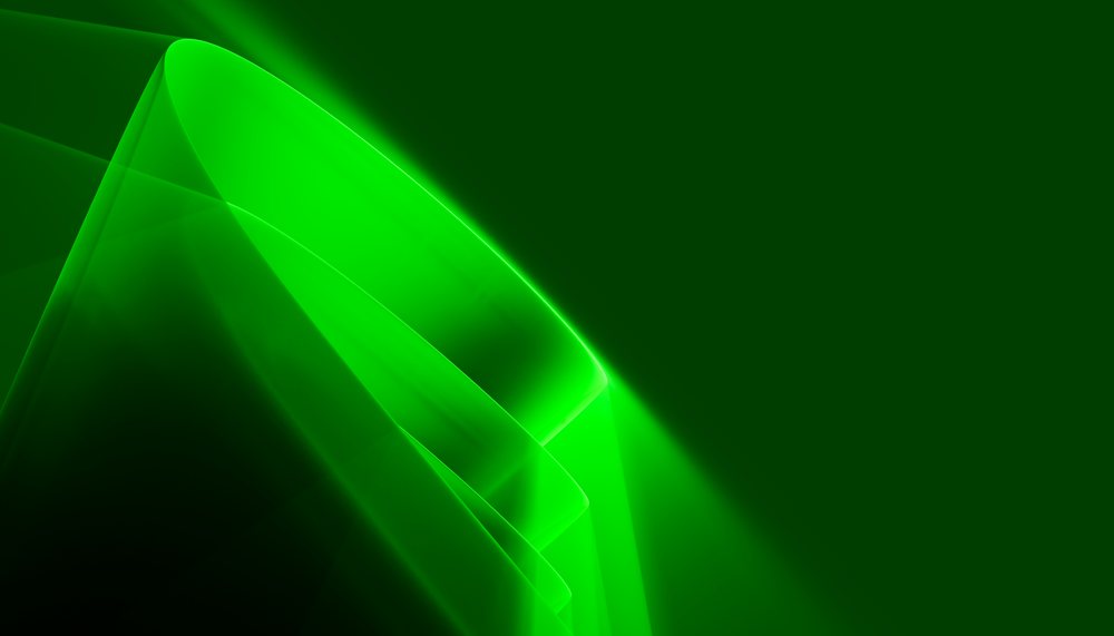 Abstract digital art with glowing green curved lines on dark