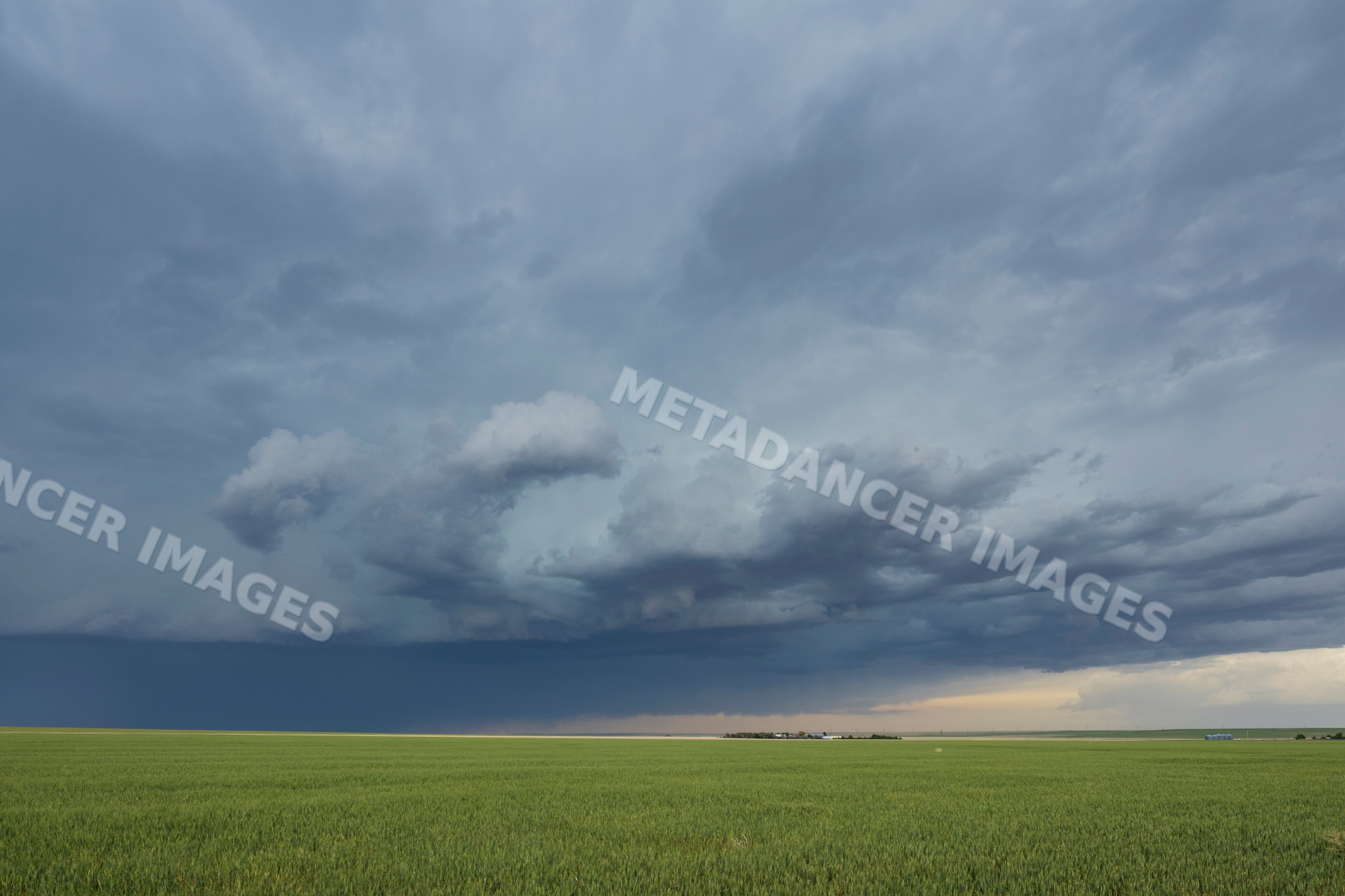 Storm clouds over open field on the Great Plains near lindon, colorado