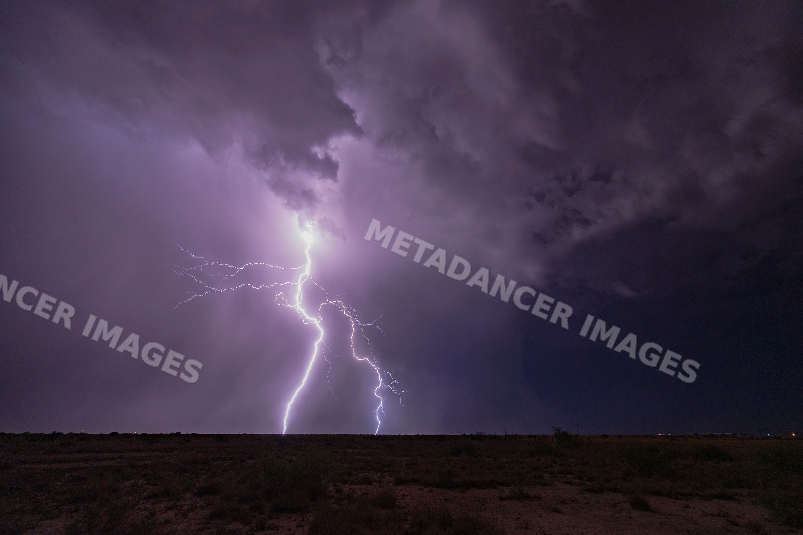 Haboob with Lightning strike under Storm clouds in mcneal, Arizona
